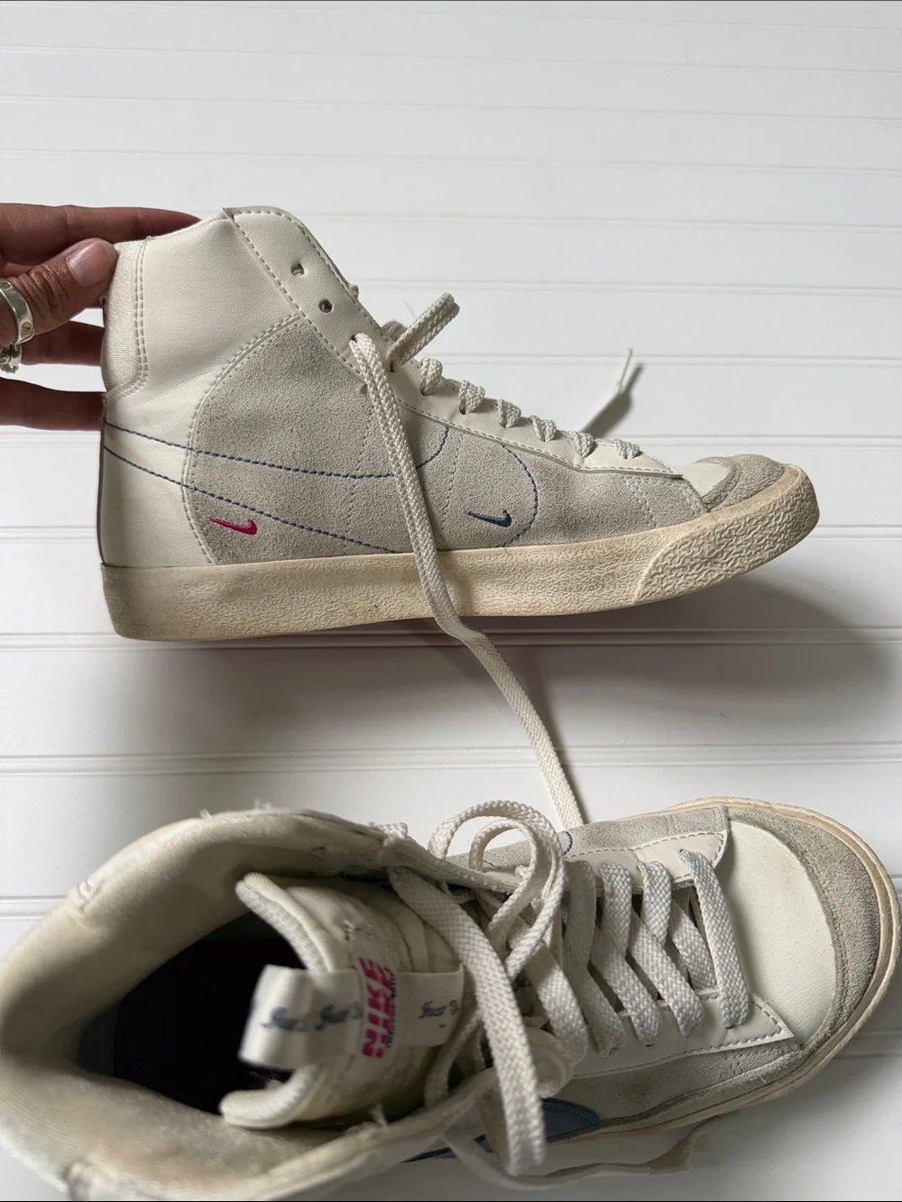 Nike Blazer Mid Top Sneakers in White and Blue Swoosh